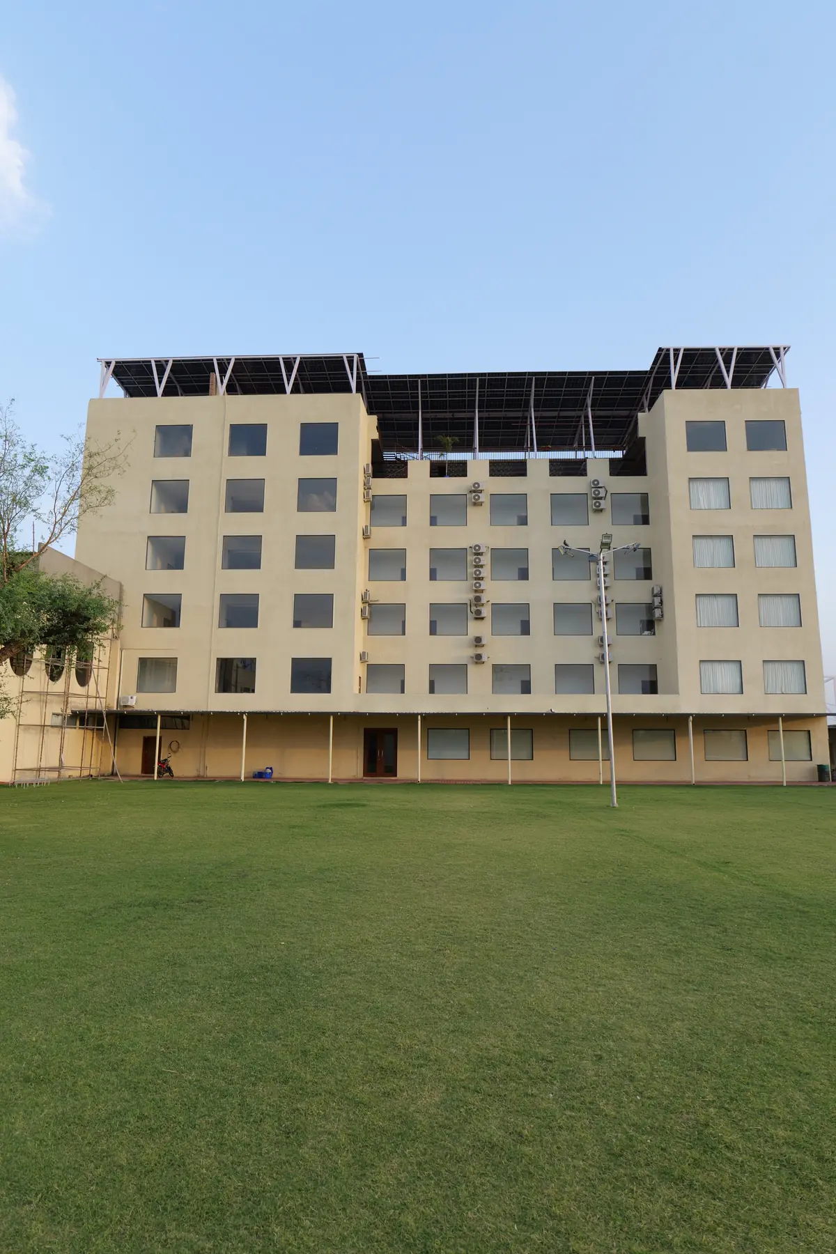 The hotel building and its wide front lawn