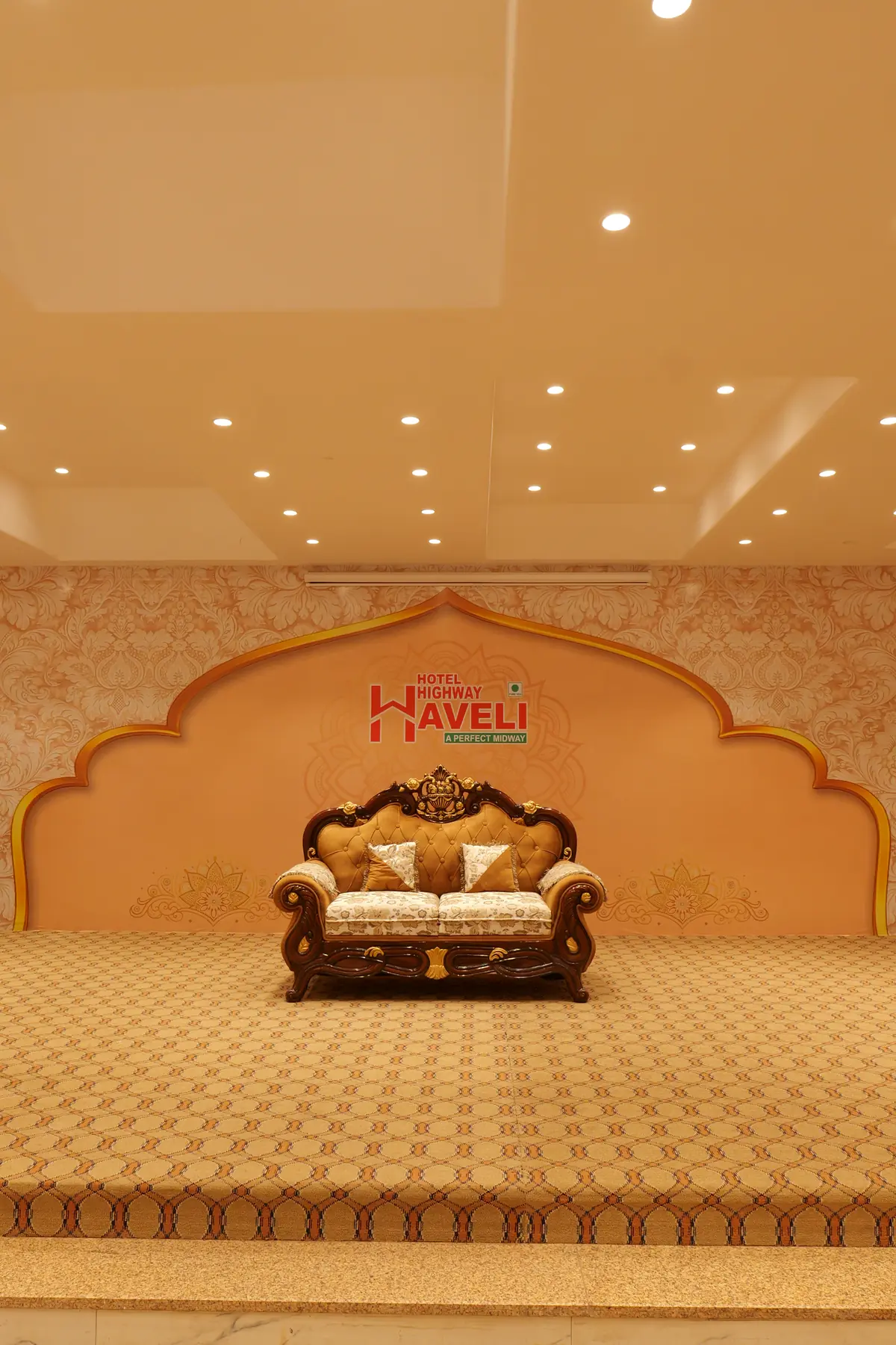 Banquet stage with a carved sofa
