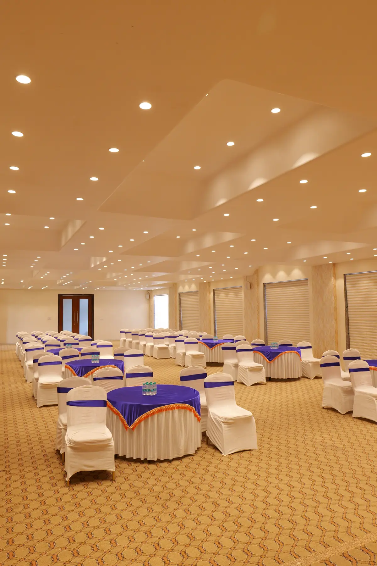 Banquet hall laid out with round dining tables