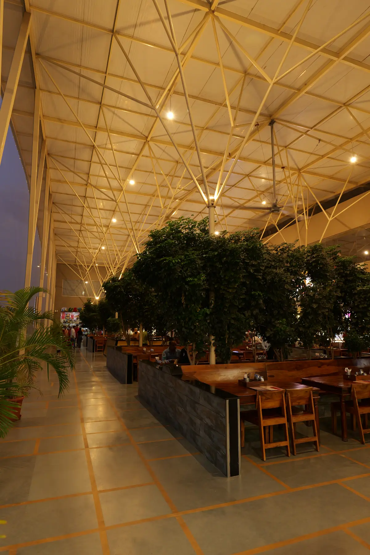 Evening dining under the illuminated canopy