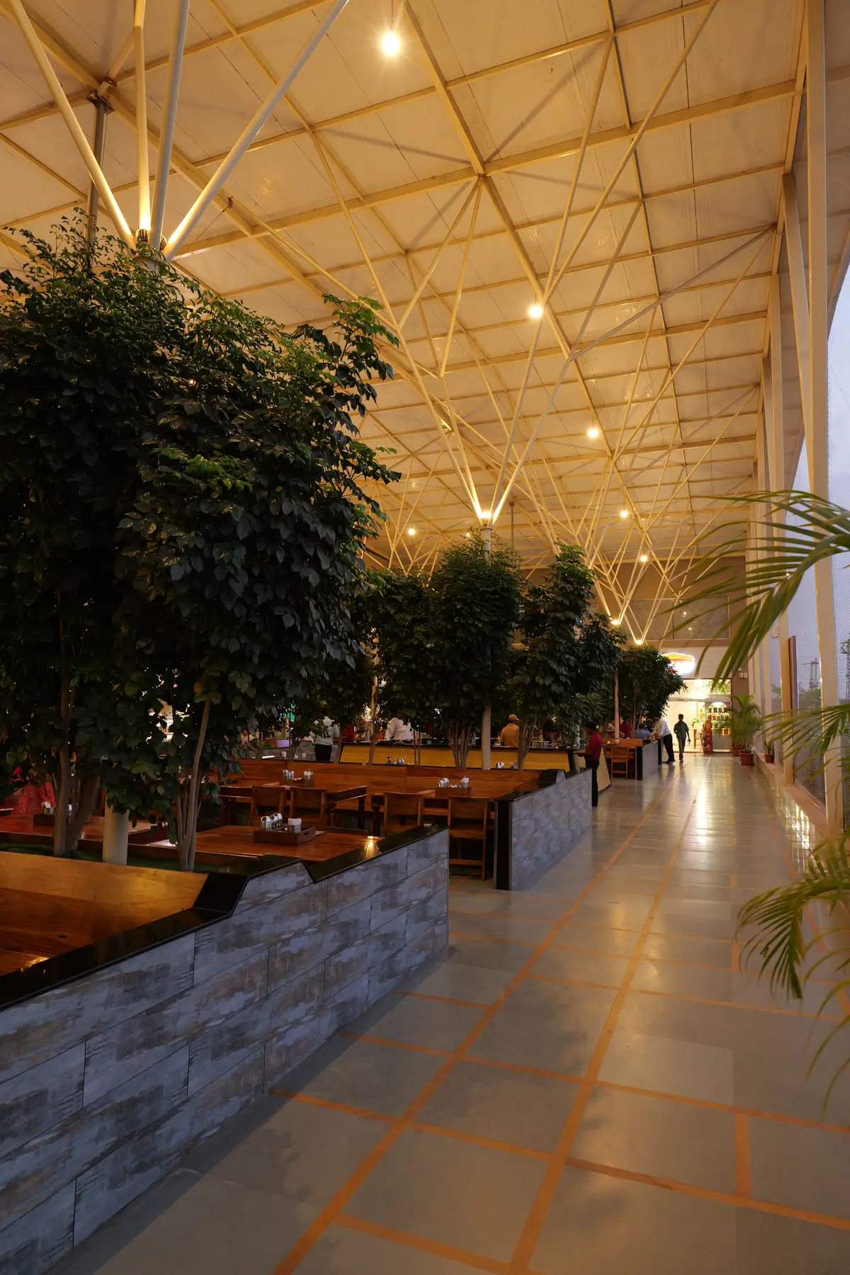 Dining area under the canopy in the evening