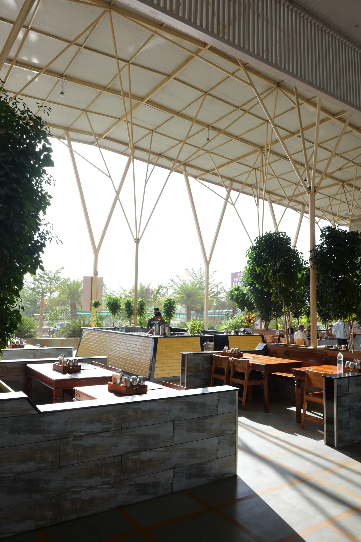 Open-air seating with garden views