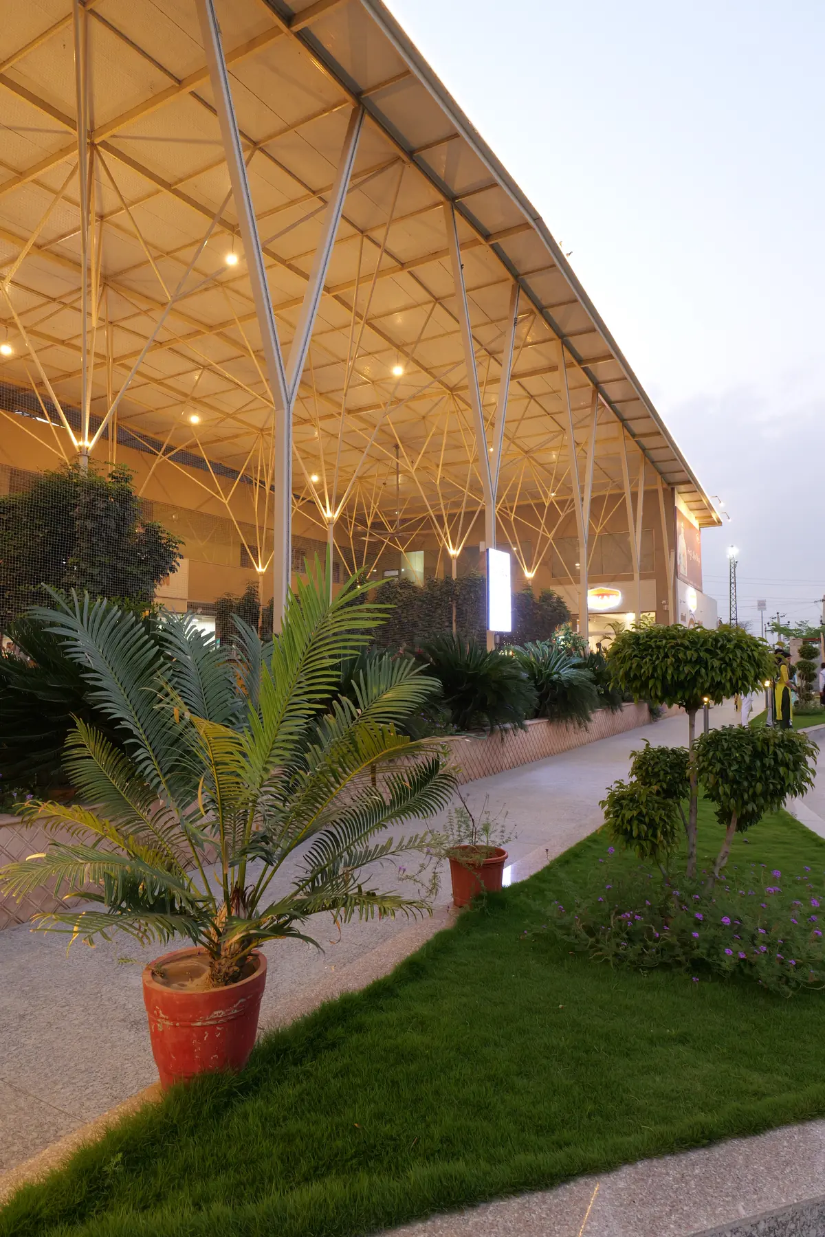 Gardens beside the canopy at dusk