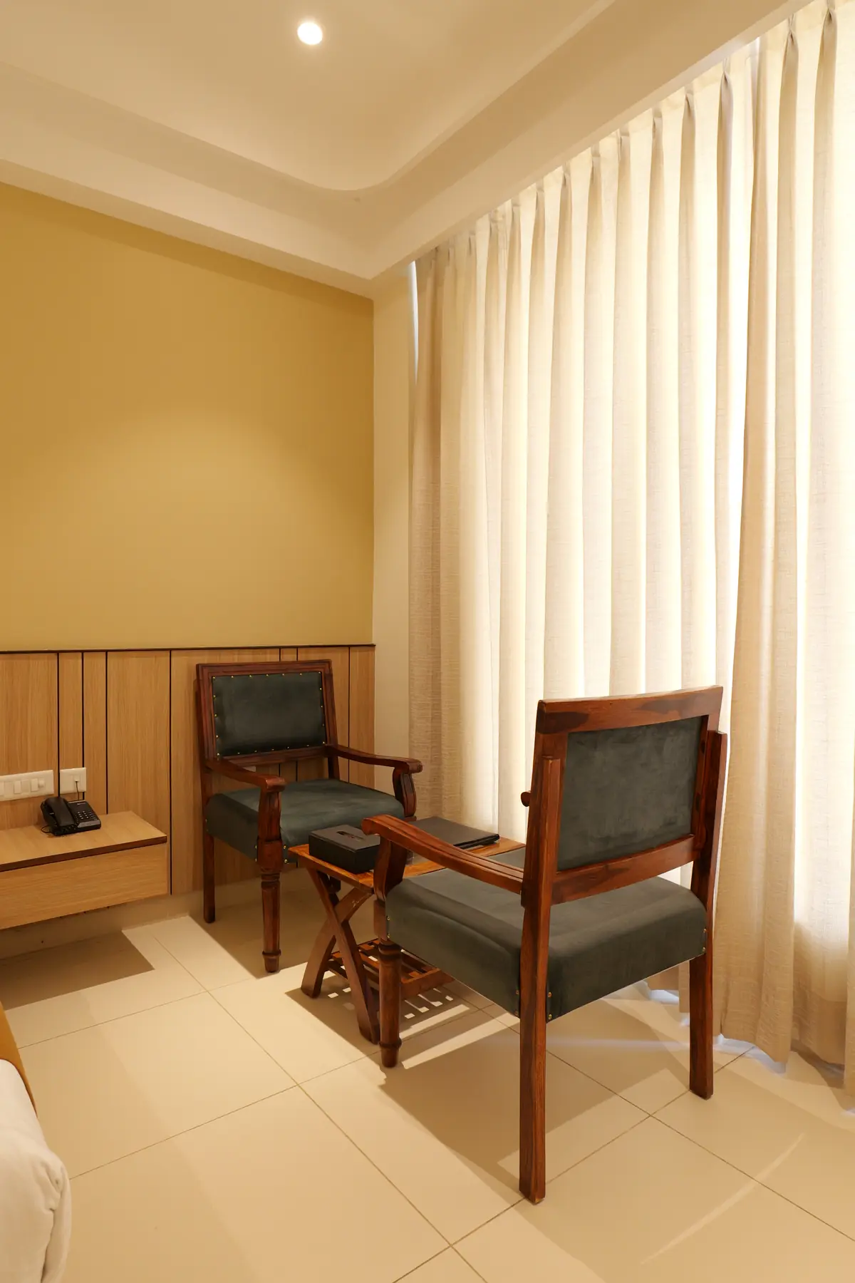 Armchairs and writing desk in a guest room