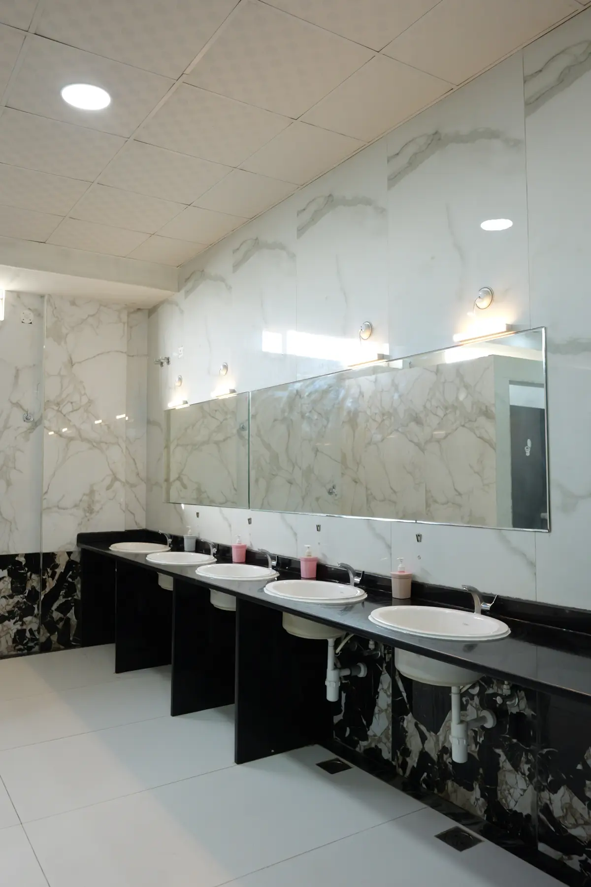 Clean washroom with marble vanity